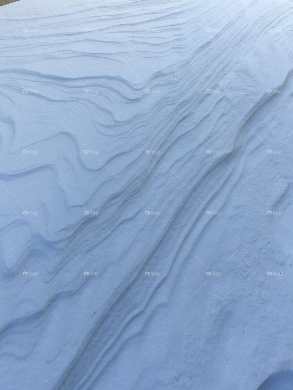 Waves of snow