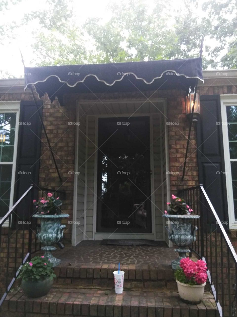 awning covered front door