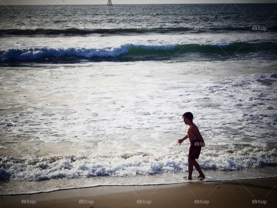 Boy Braving the Winter Water