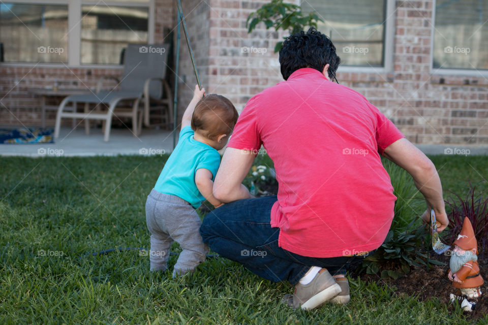 Gardening son and dad