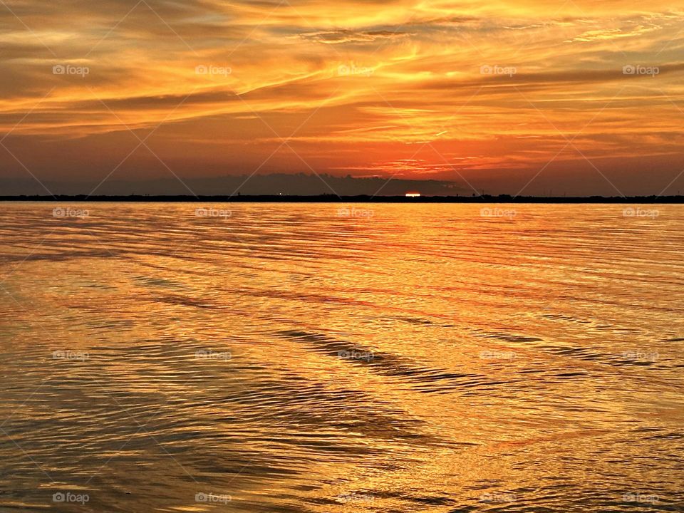 The strange thing about the sunset is that we actually don’t want the sun to set, we want it to stay right on the horizon, just right on it!