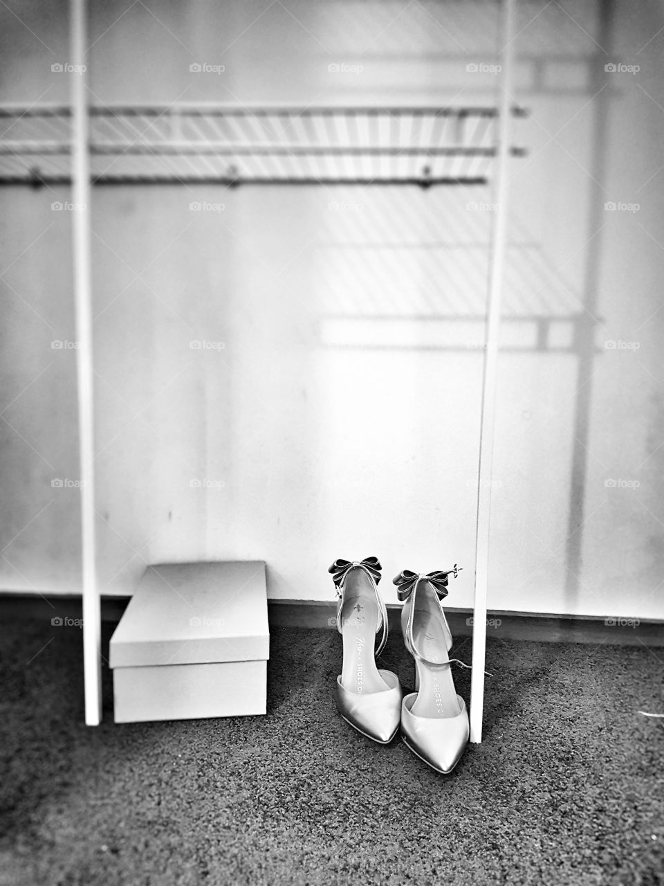 wedding shoes in empty wardrobe