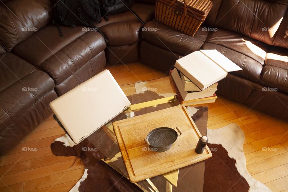 A livingroom in a residential home gets transformed into a science class study hall.