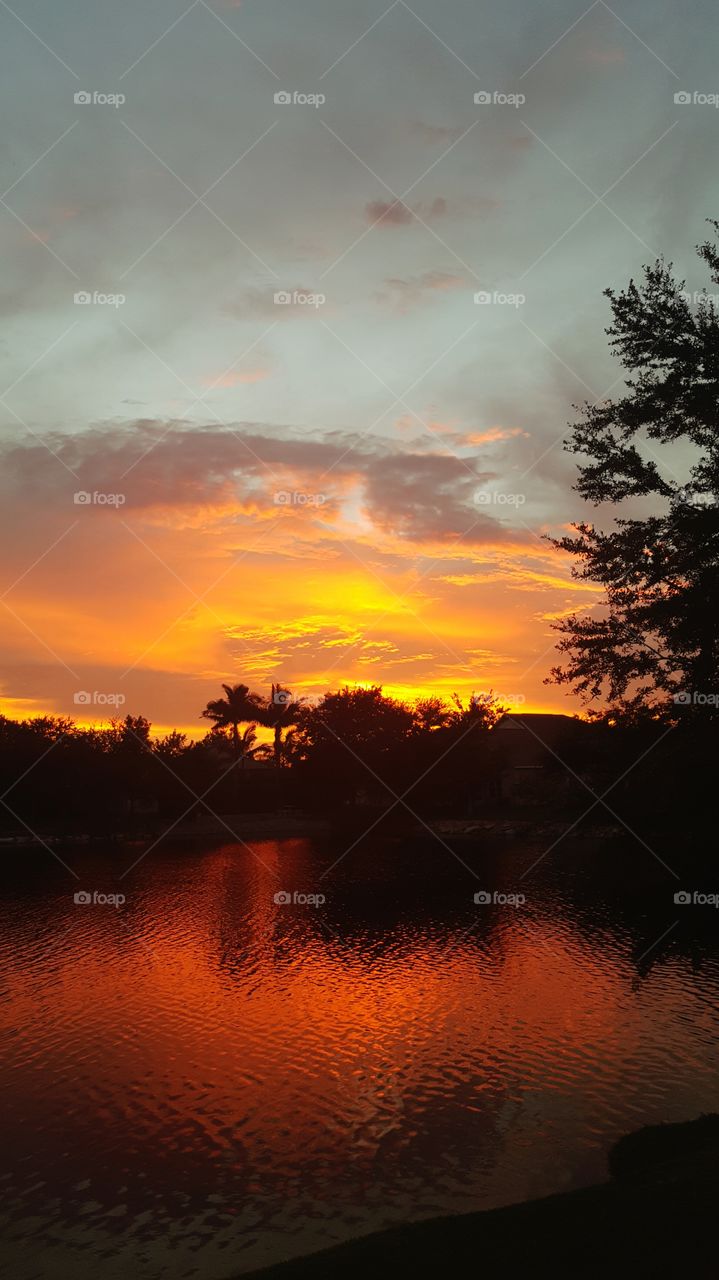 Idyllic lake against dramatic sky