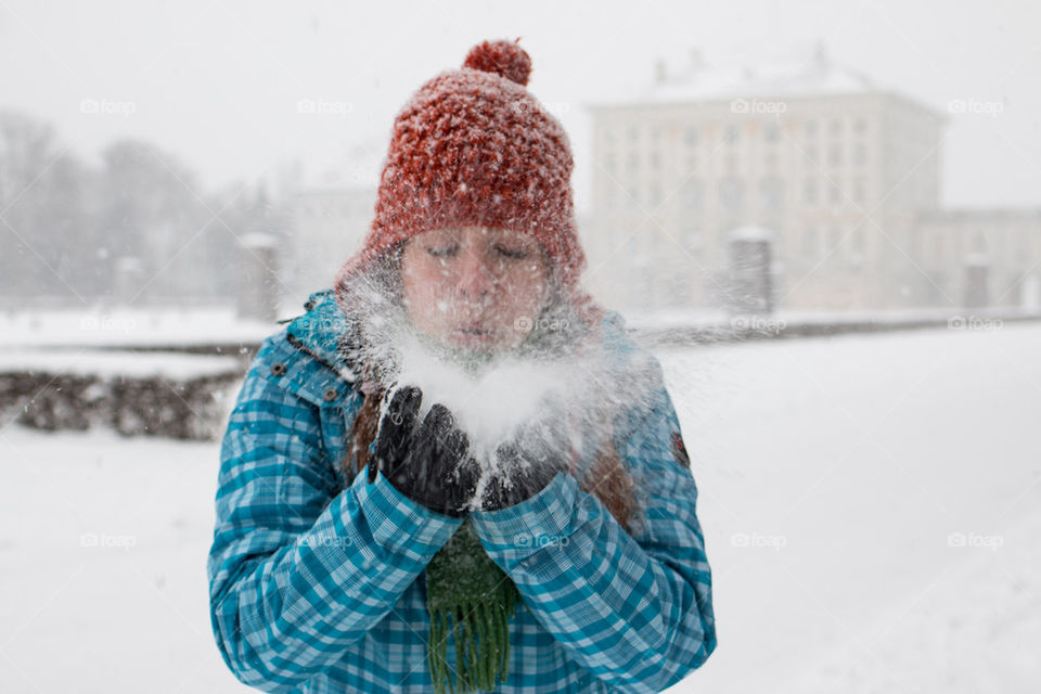 My wife playing in the snow by Nymphenburg palace 