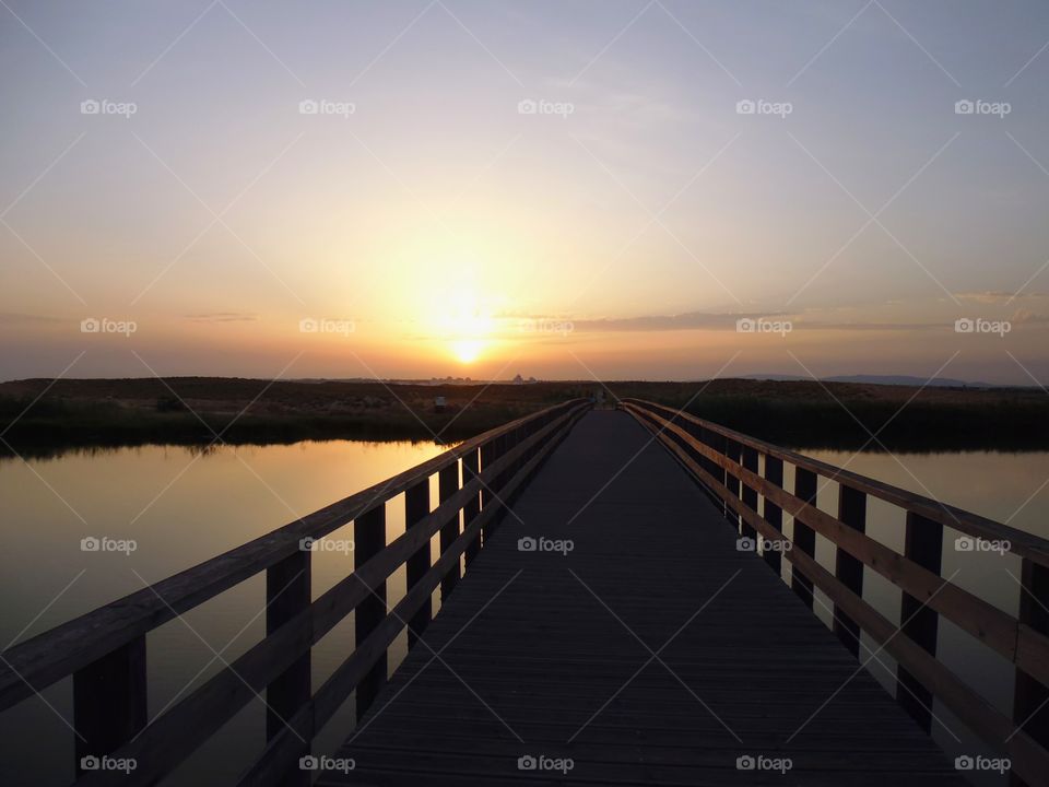 Foot bridge at sunset