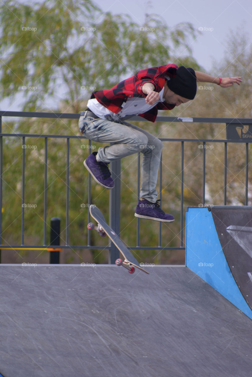 man rides a skateboard. skateboarder