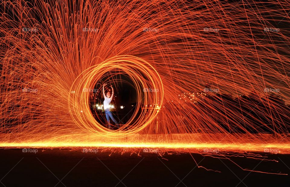 spinning fire marks at night