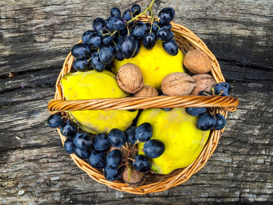 Quinces with red grape and walnut