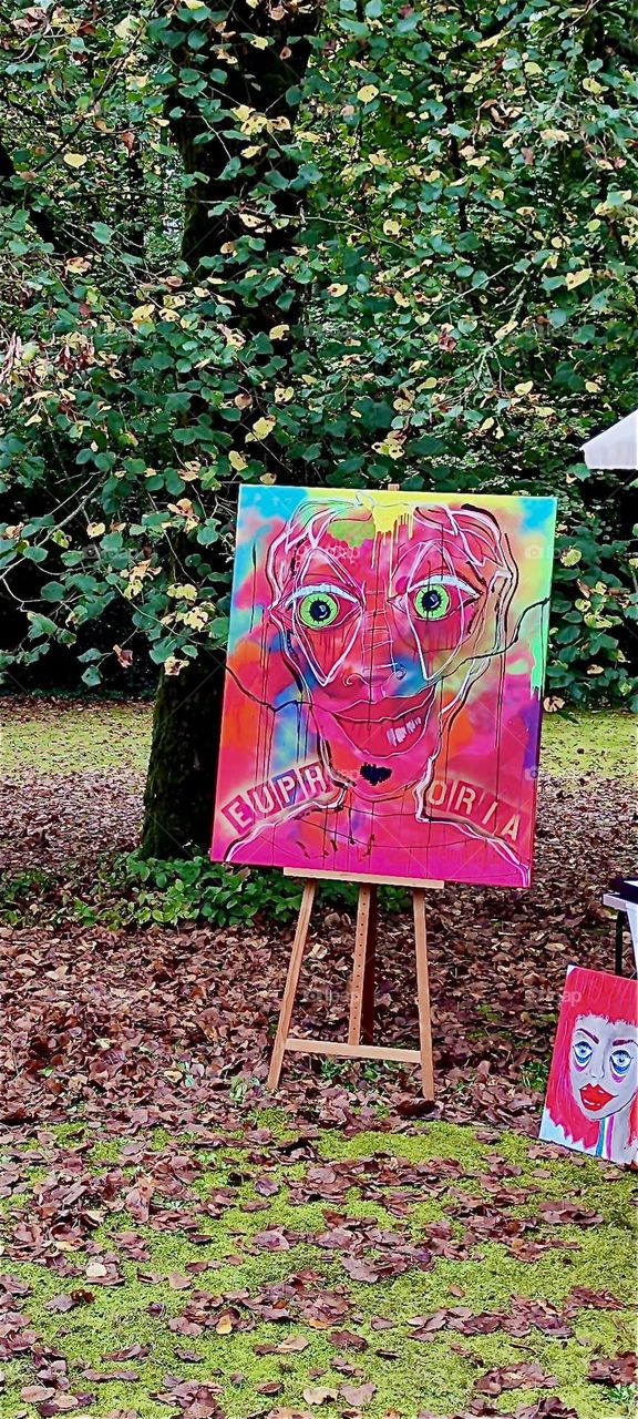 “EUPHORIA” is displayed on this canvas at the “Market of Possibilities” here in the garden and apple orchard of the old castle of “Steinach” in “Lower Bavaria”, Germany. It sure gets my blood flowing !!! 2024. Hypnotic Productions