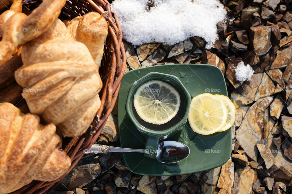 Lemon tea and croissants