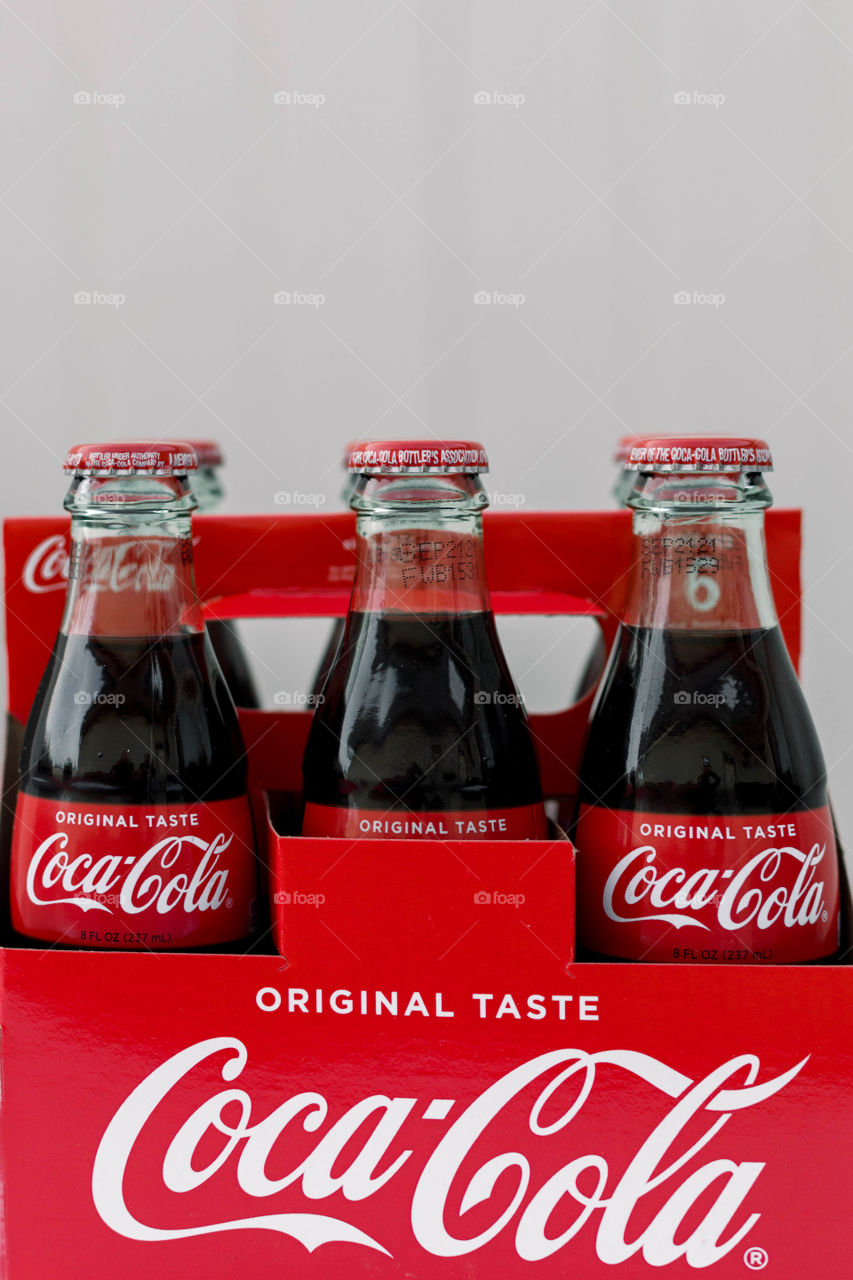 Coke package against a white background 