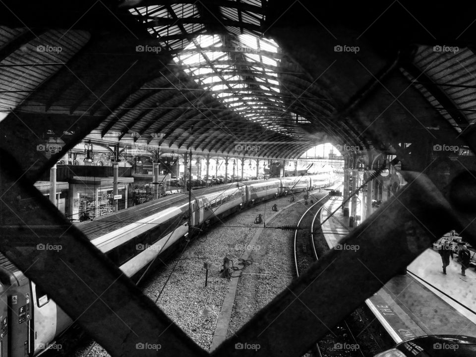 Newcastle Central Station ... peeping at the tracks over the pedestrian bridge 