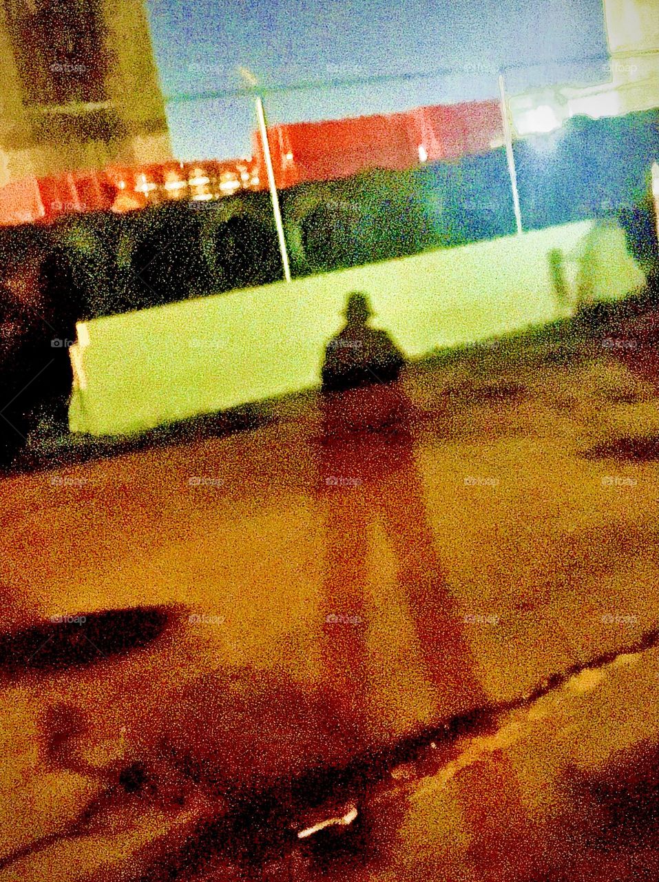 Petra Schiller is casting an unusually long shadow over the parking lot underneath the Pulaski Bridge in Long Island City, Queens, New York coming home one late evening in 2020. Hypnotic Productions