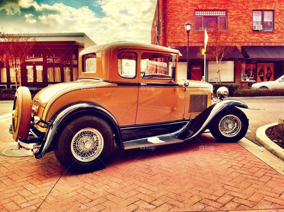 Old vintage car in old town 