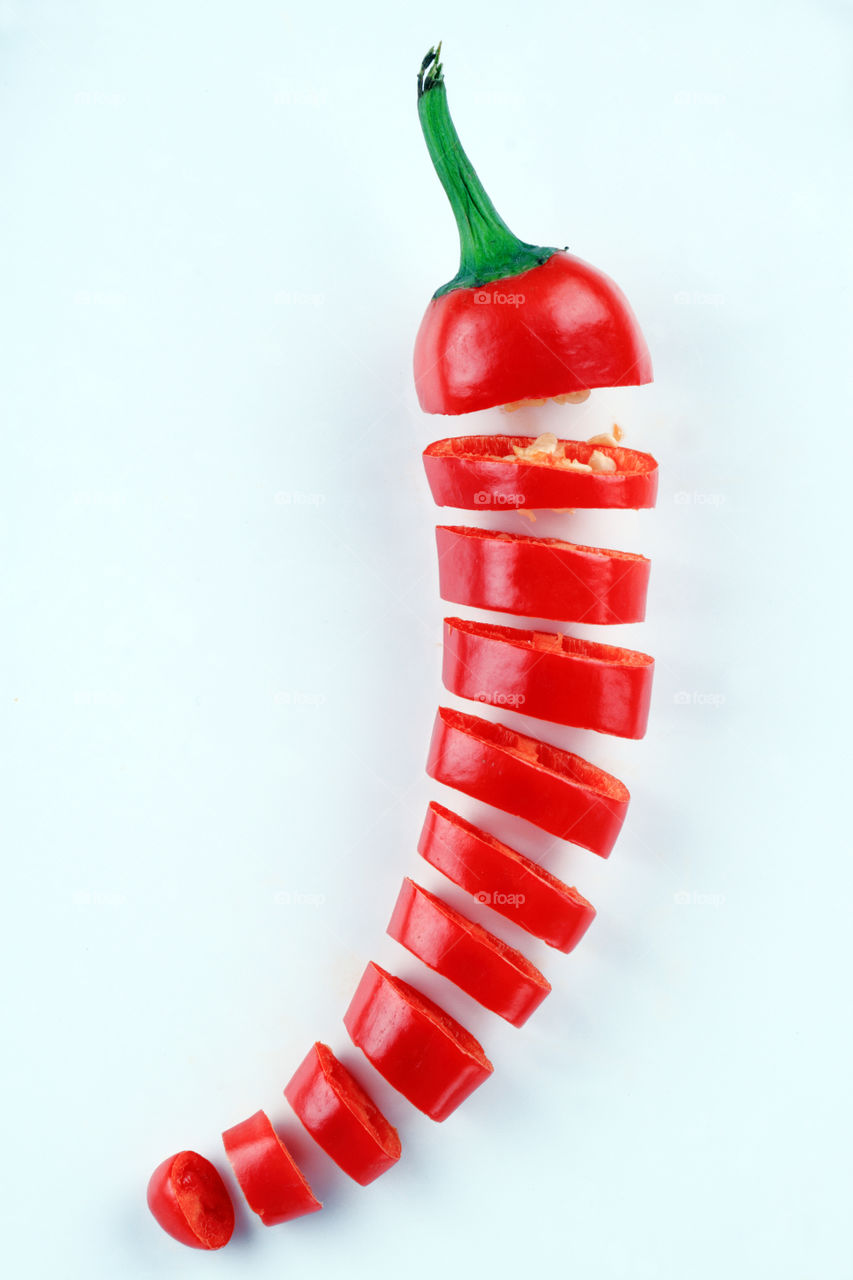 Cut Red chili on white background