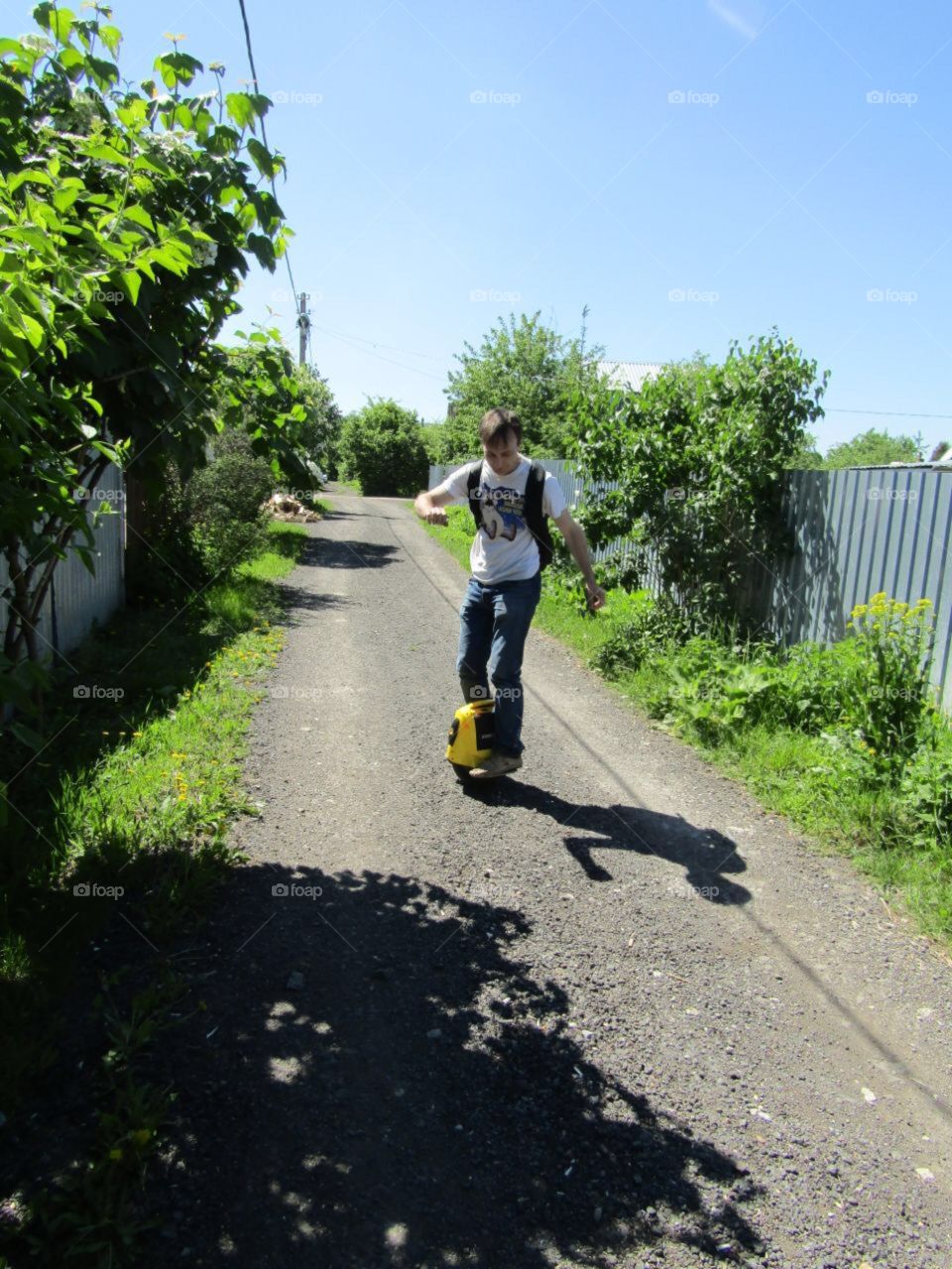 Riding a monocycle.