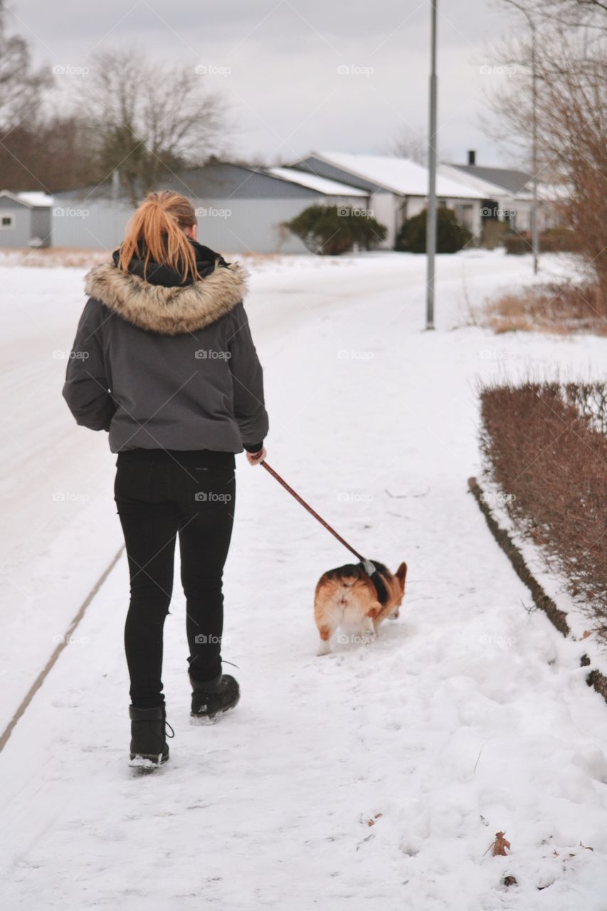 Girl walking her dog