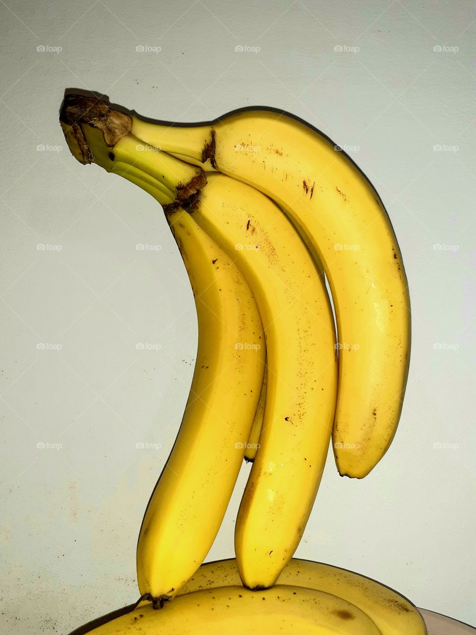 Bananas closed up throw the Wall