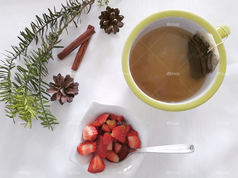 Strawberries and mint tea with simple natural decor