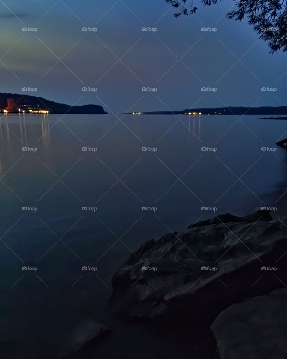 Night time on the Hudson River. A long exposure shot of the Hudson River one hour after sundown (the blue hour). 