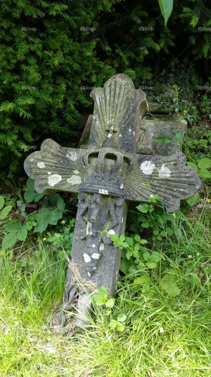 100 + years old graves
Some people think graveyard and cemetery mean the same, but, if we want to be a little nitpicky, we should say that graveyard is a type of cemetery, but a cemetery is usually not a graveyard. To understand the difference, we need a little bit of history.
From about the 7th century, the process of burial was firmly in the hands of the Church (meaning the organization), and burying the dead was only allowed on the lands near a church (now referring to the building), the so-called churchyard. The part of the churchyard used for burial is called graveyard, an example of which you can see in the picture.
As the population of Europe started to grow, the capacity of graveyards was no longer sufficient (the population of modern Europe is almost 40 times higher than it was in the 7th century). By the end of the 18th century, the unsustainability of church burials became apparent, and completely new places, independent of graveyards, were devised—and these were called cemeteries.
The etymology of the two words is also quite intriguing. The origin of "graveyard" is rather obvious; it is a yard filled with graves. However, you might be surprised to hear that "grave" comes from Proto-Germanic *graban, meaning "to dig", and is unrelated to "gravel".
Of course, the word "cemetery" did not appear out of the blue when graveyards started to burst at the seams. It comes from Old French cimetiere, which meant, well, graveyard. Nevertheless, the French word originally comes from Greek koimeterion, meaning "a sleeping place". Isn't that poetic?