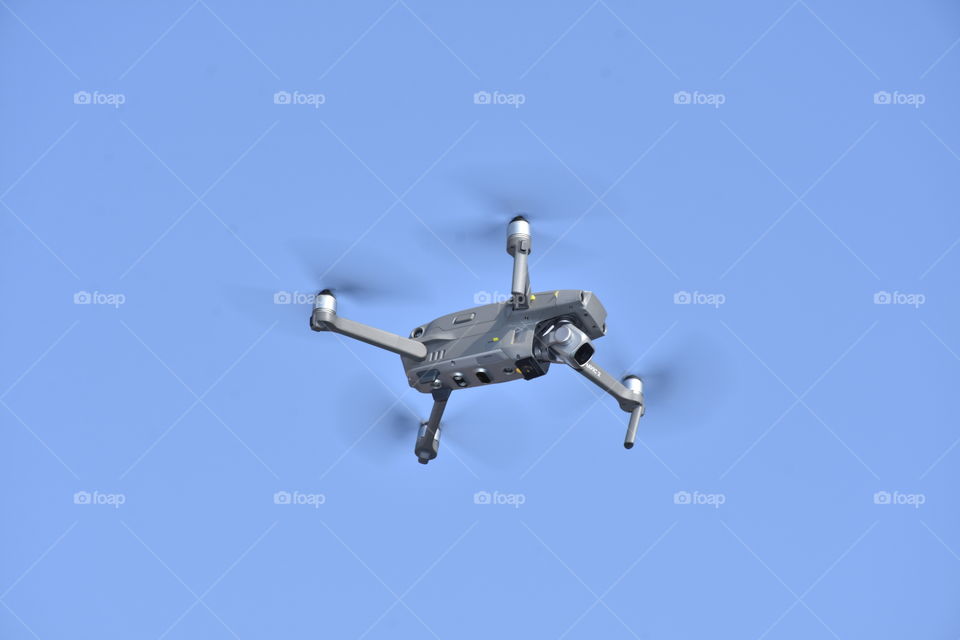 Flying Drone Camera And Blue Sky in the Background