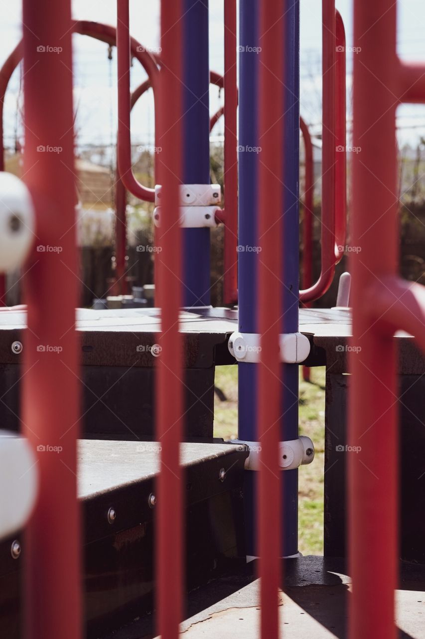 Abstract With Playground Equipment, Playground At The Park, Through The Bars 