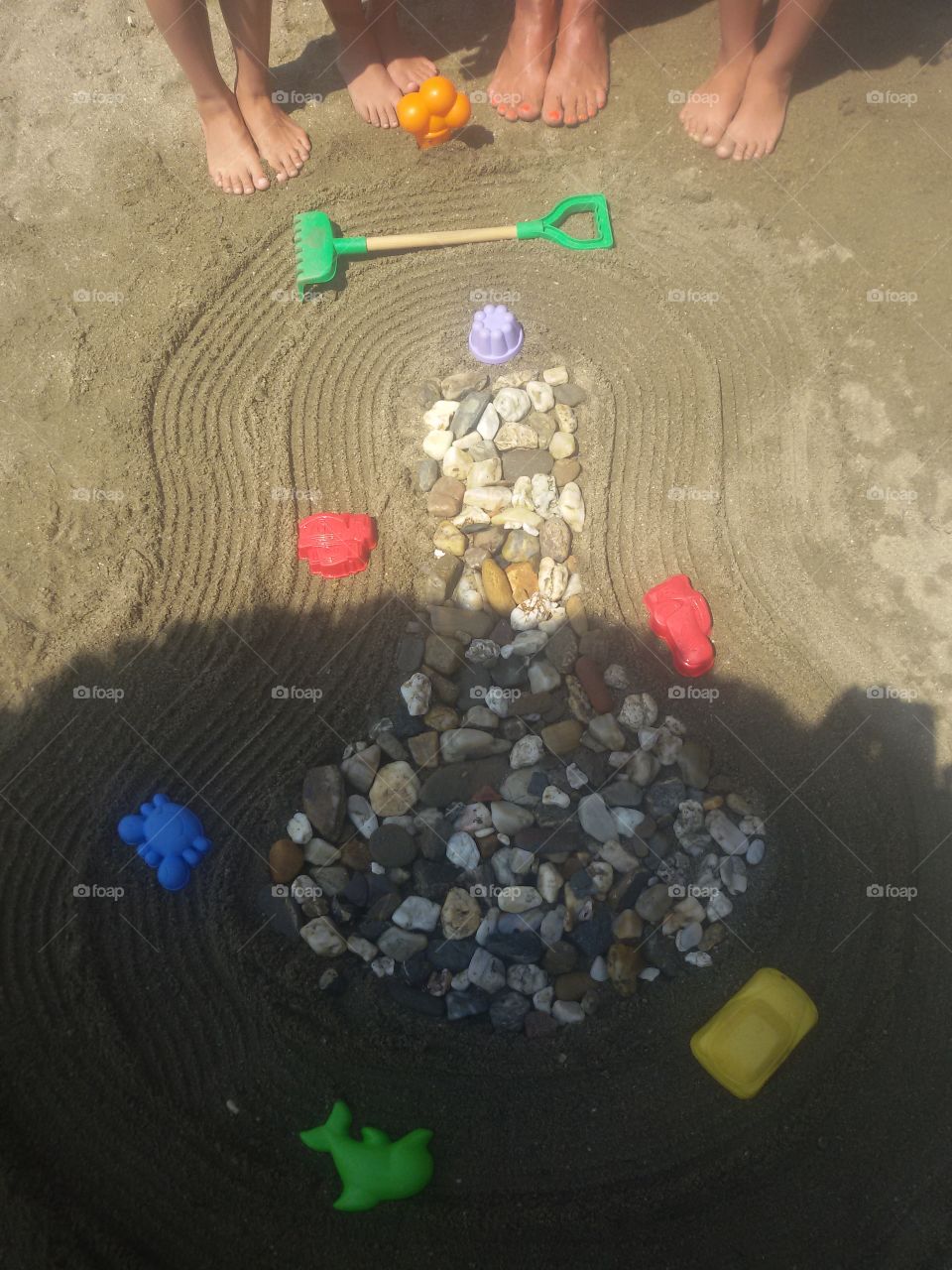 Tree made of rocks on beach