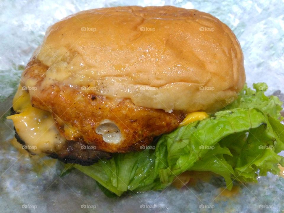 Delicious beef burger with cheese