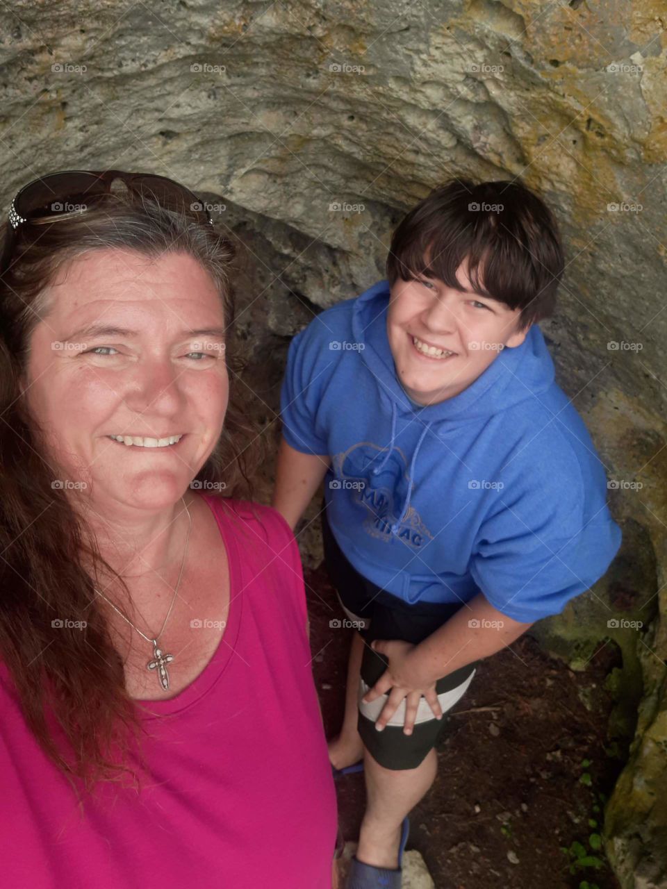 woman and son inside a small cave.