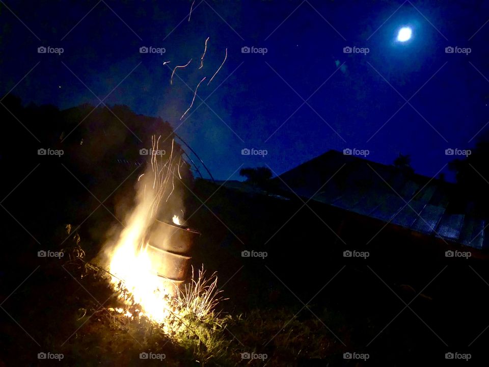 Burning Barrel and Bonfire, burning, barrel, bonfire, night, summer, moon, sky, reflection, corrugated, steel, shed, outbuilding, flames, brush, fire, smoke, billowing