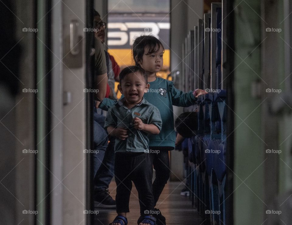 Kids enjoy on the train trip 