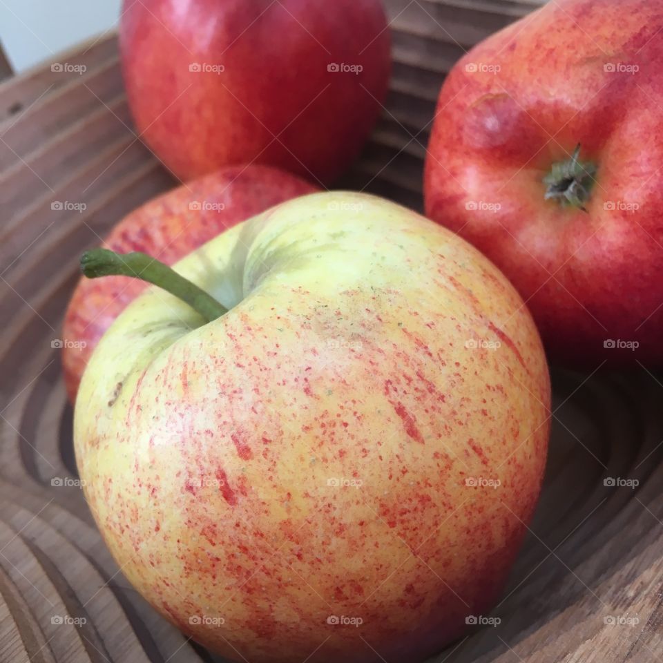 Apples in a fruit bowl/basket
