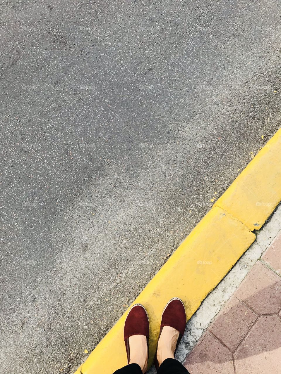 Feet on a sidewalk 