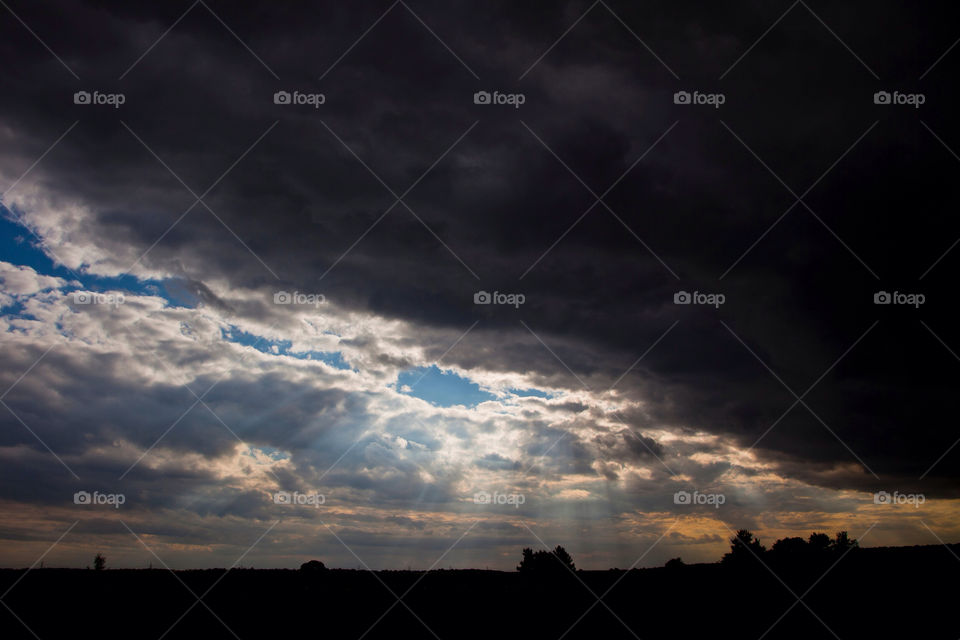 dark sunset clouds england by vinnyme
