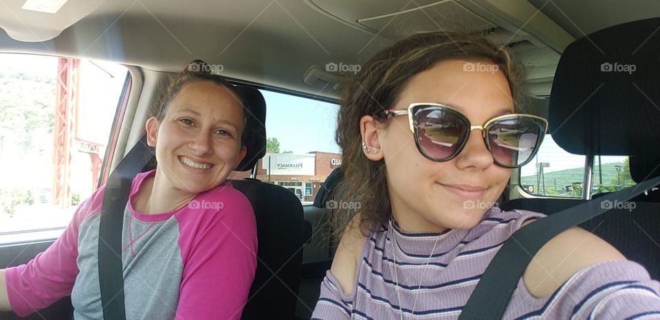 Two Young Women in Ride Share Car