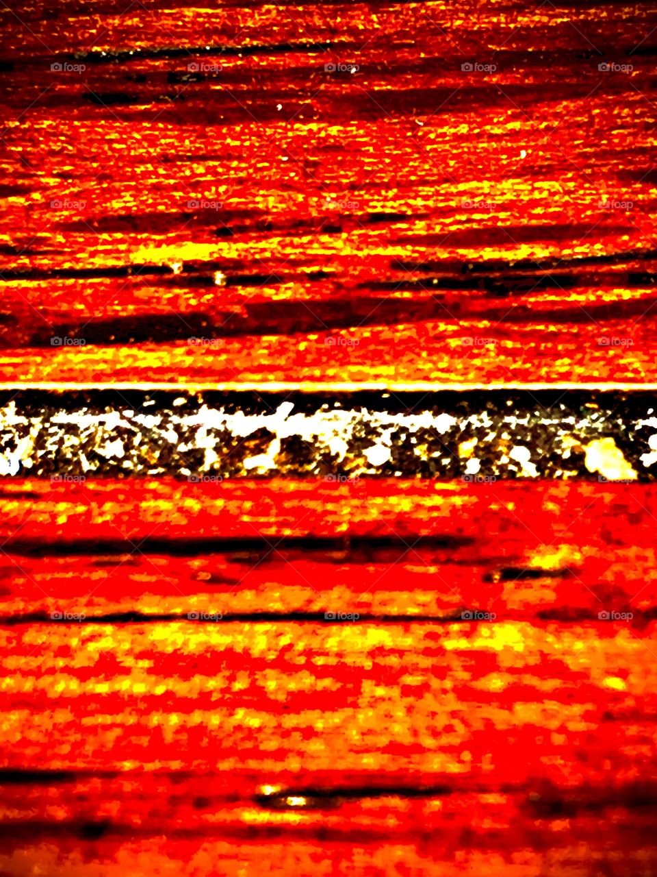 An abstract photograph of hues, values, patterns, and texture combined to give off an unique feeling of warmth or present the hot concept of something spicy. The elements in the photo allow the viewers to be subjective about it in their own ways.