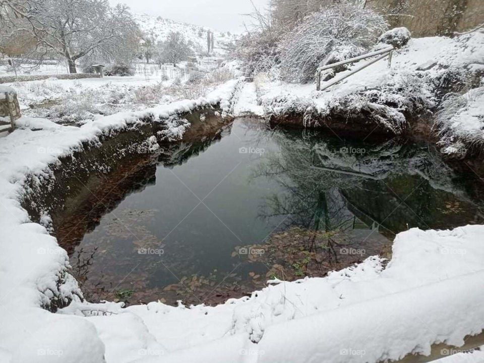 Beautiful snowy safe fountain background