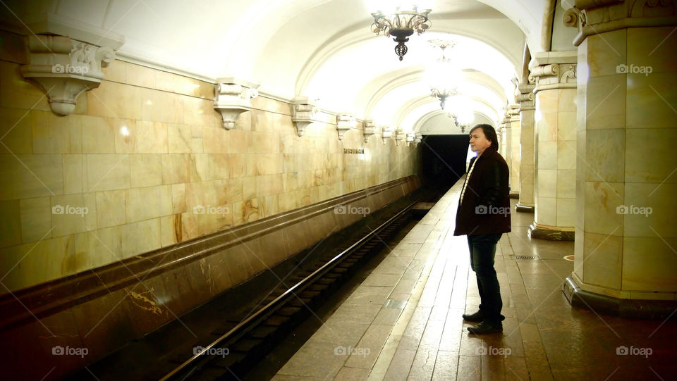 underground train waiting man by lenusik