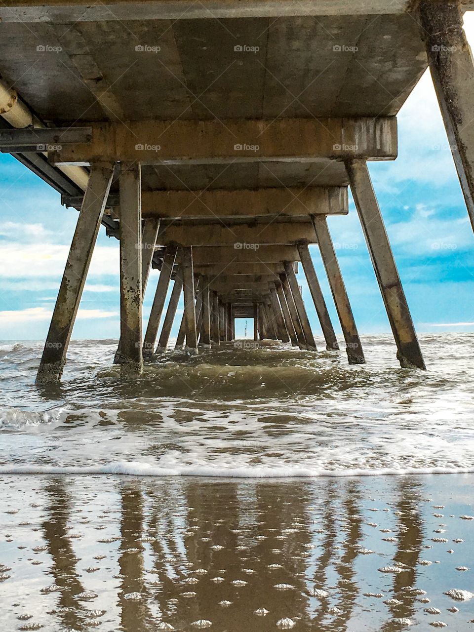 Reflections under the pier south Australia beach