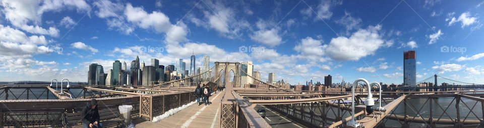 New York City futuristic skyline from the great Brooklyn Bridge in Downtown New York