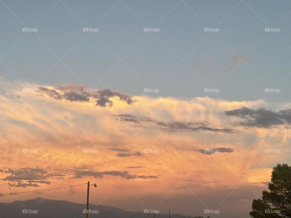 A photo of orange clouds. 