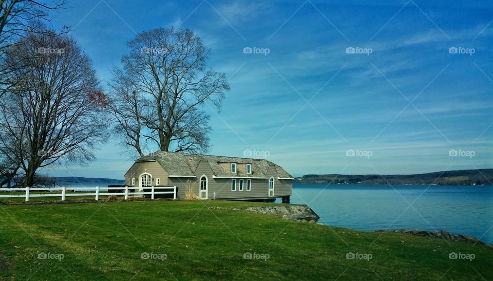 Scenic view of boathouse in lake