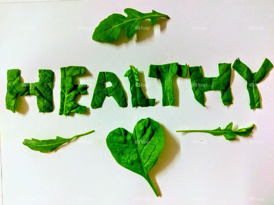 Healthy text made up of fresh green leaves