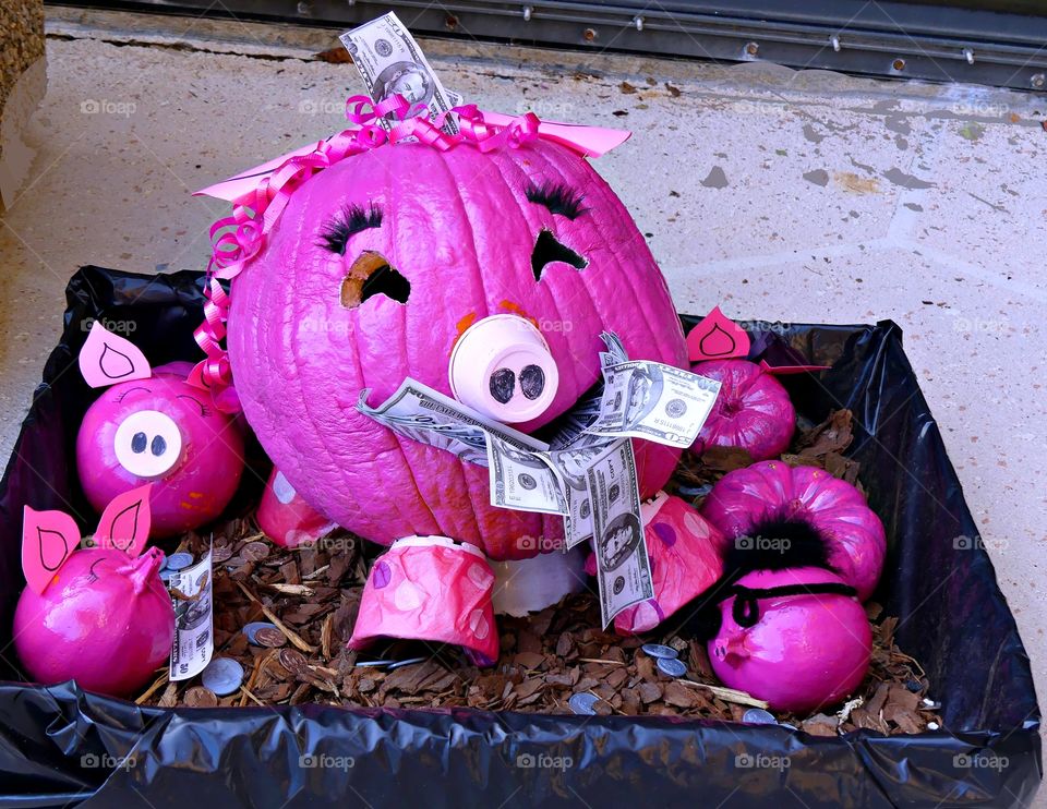 Trick-or-Treat - Painted Pink Pumpkin Piggy Bank stuffed full of money 