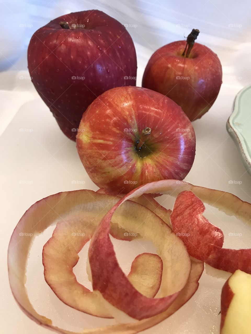 Red apples peeling in circles 