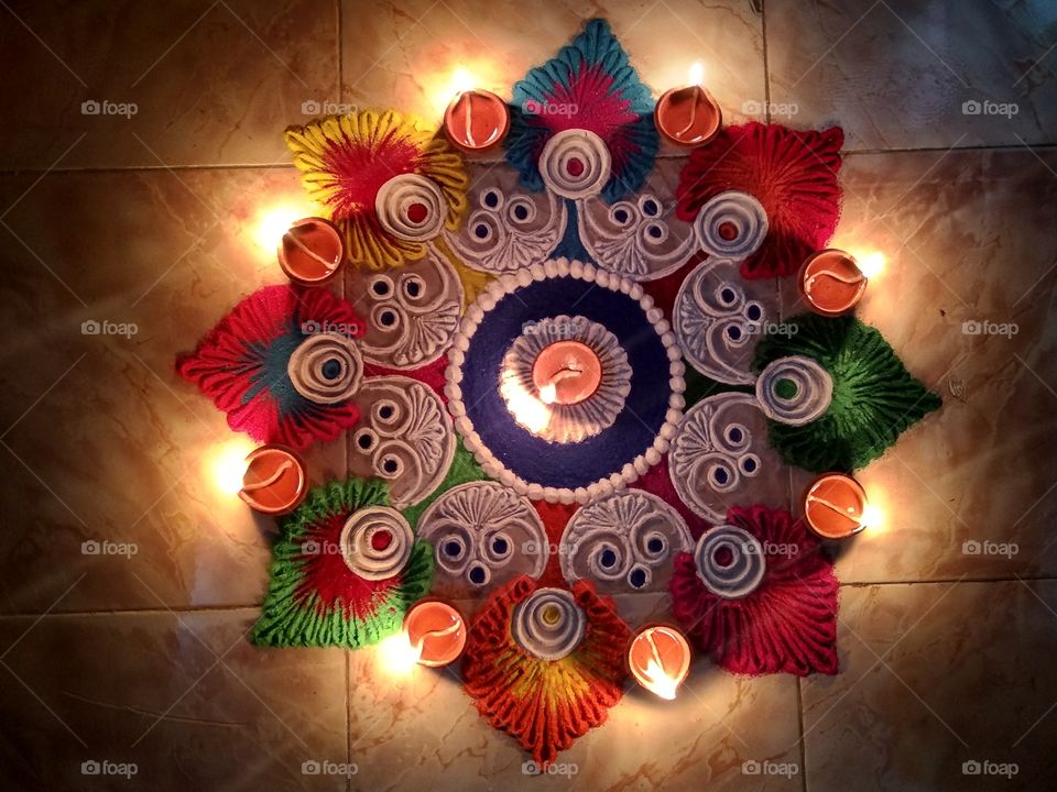 Beautiful Rangoli made on the occasion of Diwali ( Deepawali ) / The festival of Lights, decorations, joy and happiness / The Indian Festival / Culture and Traditions / Colorful Street Drawing / Lamps / Gleam / Happiness Everywhere / Happy Diwali