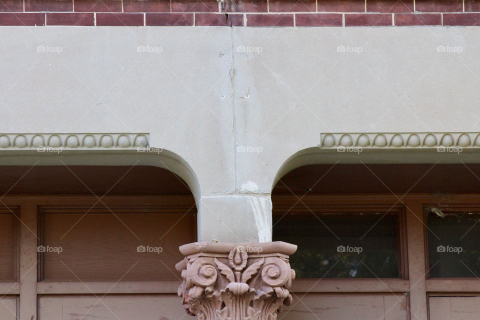 Architectural detail on the side of an historical brick building