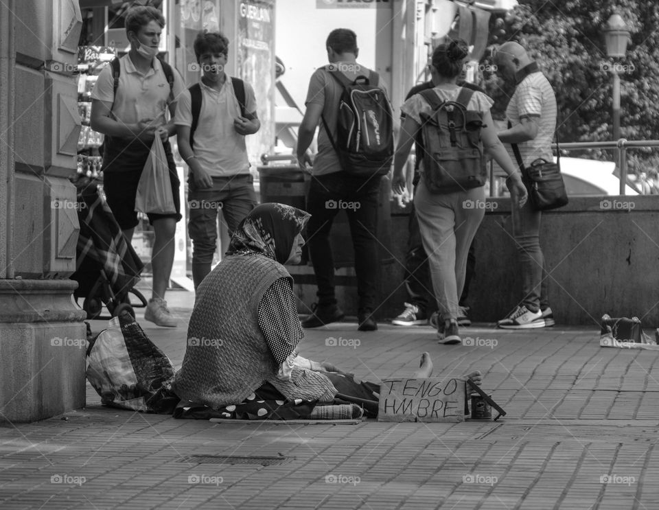 an old woman in the street